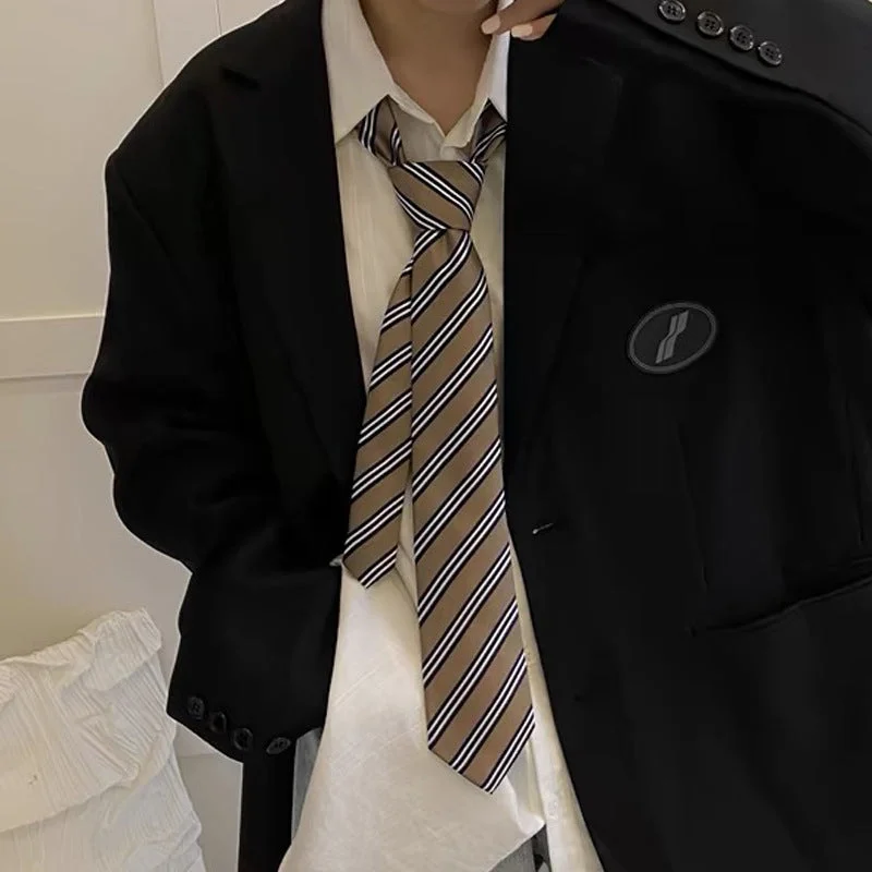 beige and white striped hand tie