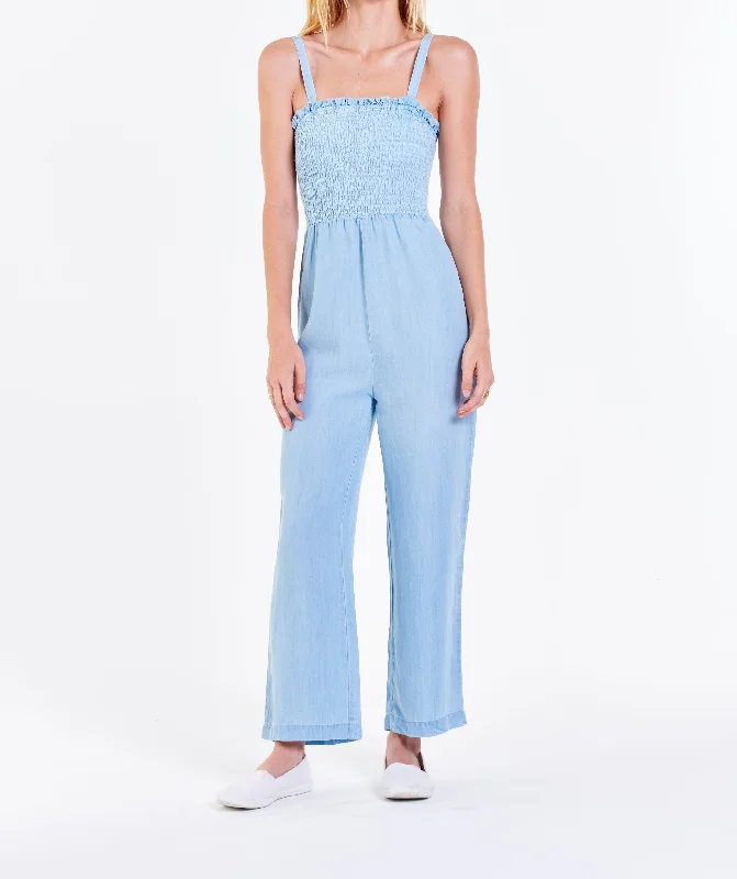 BELINDA SMOCKED BODICE JUMPSUIT CAROLINA BLUE Floral print jumpsuit, Feminine, Casual, Trendy BELINDA SMOCKED BODICE JUMPSUIT CAROLINA BLUE Floral print jumpsuit, Feminine, Casual, Trendy