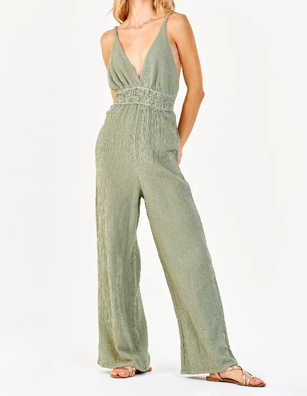 IMANI STRAP HALTER JUMPSUIT SWEET OLIVE Vintage-inspired jumpsuit, Retro style, Trendy, Chic IMANI STRAP HALTER JUMPSUIT SWEET OLIVE Vintage-inspired jumpsuit, Retro style, Trendy, Chic