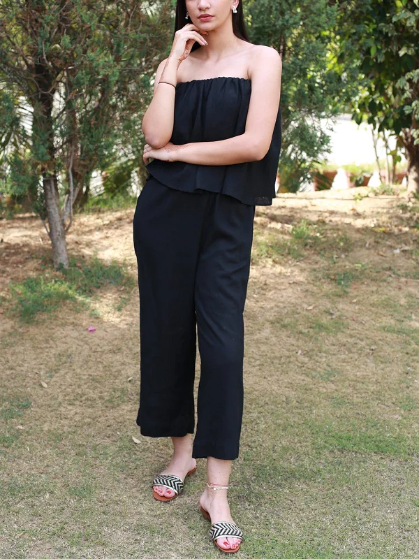 Off We Go Jumpsuit Black 71. Solid jumpsuit, Minimalist style, Sleek, Stylish